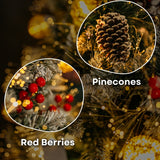 Close-up of frosted pinecone and red berry clusters nestled among the branches of a prelit Christmas tree