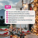 Christmas garland features: 50 warm white LEDs, 100 snow-flocked pine tips, battery pack, red and green berries, 1.83m length