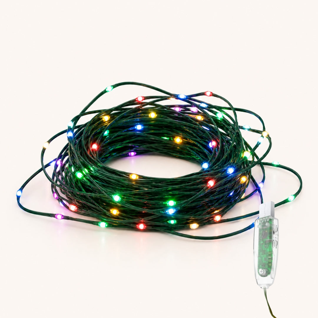 10m colourful LED fairy lights with green wire on an off-white background