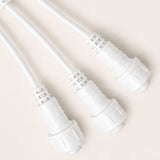 Close-up of the three weatherproof connector ends on the White 3-Way Connector for Festoon String Lights