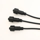 Closeup of the three attachment points on the black 3-way string light connector