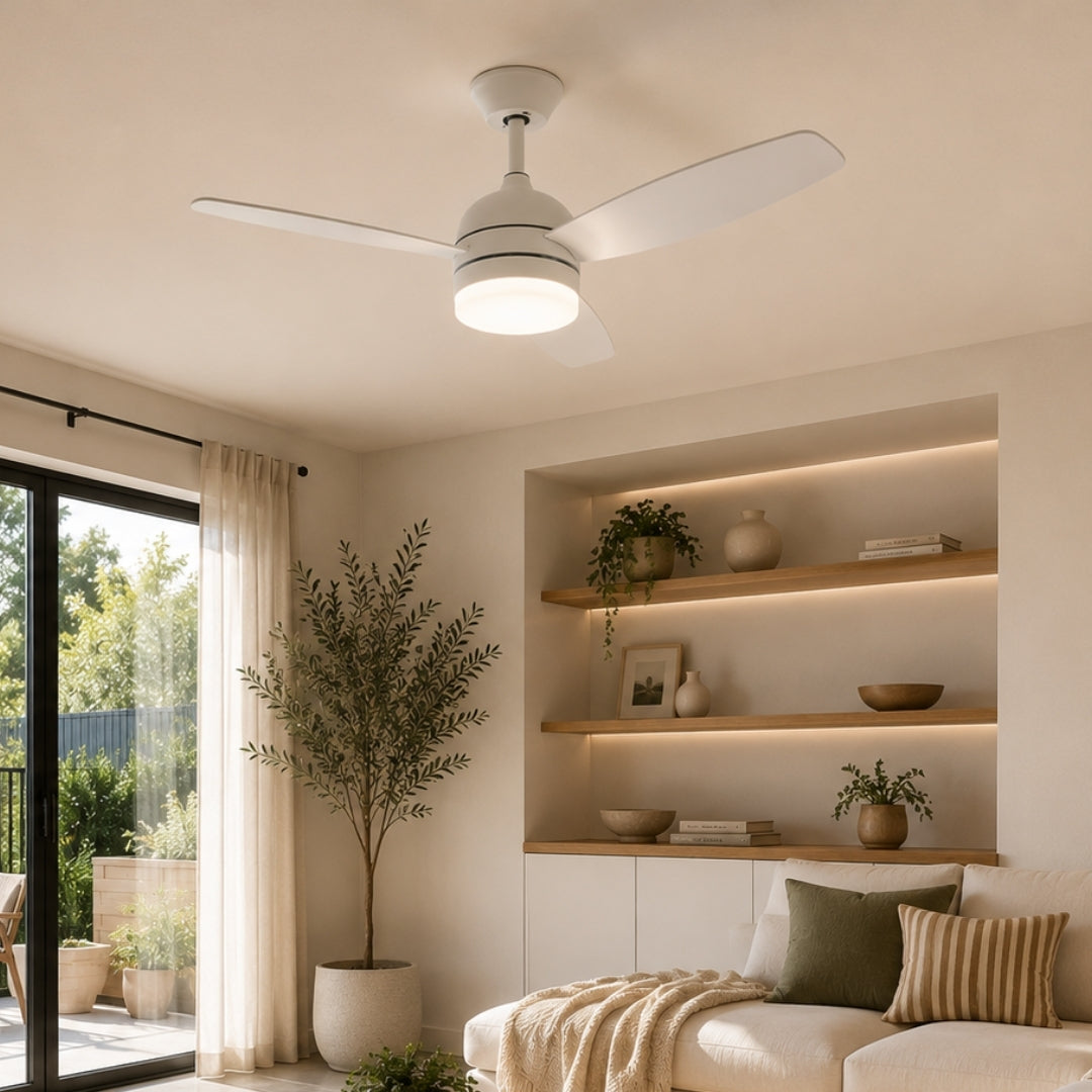 42 inch reversible wood and white blade ceiling fan installed in a modern South African lounge with warm white light glowing and three reversible blades