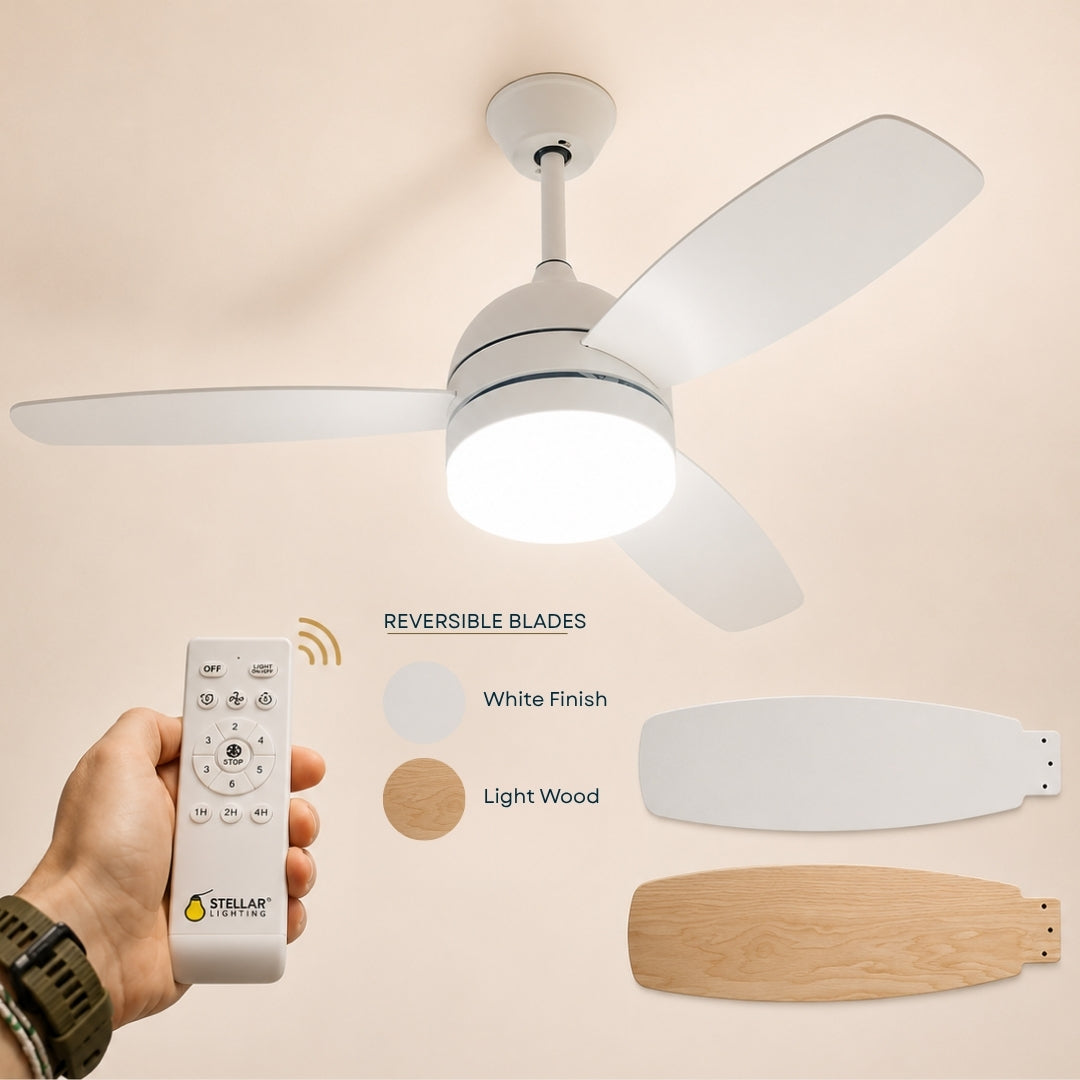 42 inch ceiling fan with three reversible MDF blades showing wood look and matte white finish options, integrated tri-colour LED light kit, and motor body on a light background