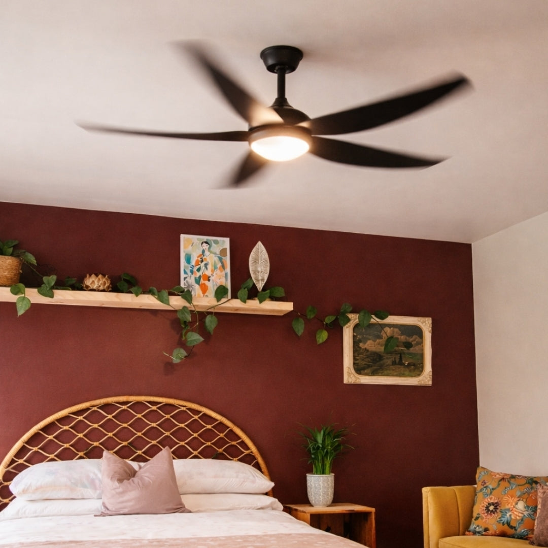 Close-up of 52 inch matte black ceiling fan showing streamlined matte black ABS blade finish and motor body from below