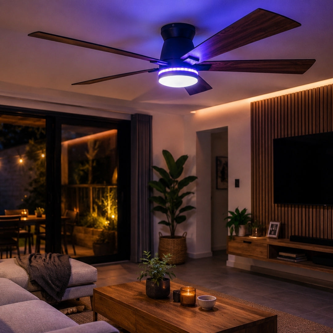52 inch black wood smart LED ceiling fan installed in a modern South African lounge with warm white light glowing and walnut wood blades