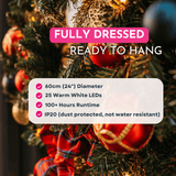 Christmas wreath specifications: 60cm diameter, 25 warm white LEDs, 100+ hours runtime, IP20 rated