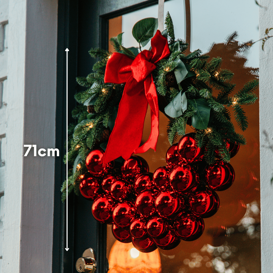 Luxury Christmas wreath on a door with 71cm size measurement shown