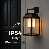 Outdoor wall solar glow lantern light fixture on a wall with raindrops, labeled 'IP54 Fully Weatherproof'.