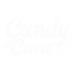 A white-on-white graphic displaying the text 'Candy Cane' in a stylized, bold font, representing Candy Cane Project brand logo.