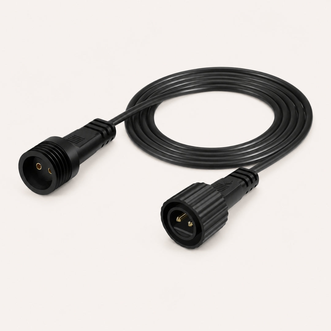 A 2m extension kit laid out on a light beige background, including a spool of 2m black cable.
