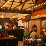 Classic String Lights with 25 warm white G40 globe bulbs strung across restaurant Caffe Mario in Knysna