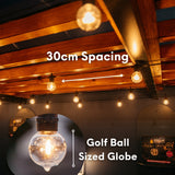 Classic String Lights Pro strung across a wooden ceiling with 30cm spacing callout and inset showing golf ball sized G40 globe bulb detail