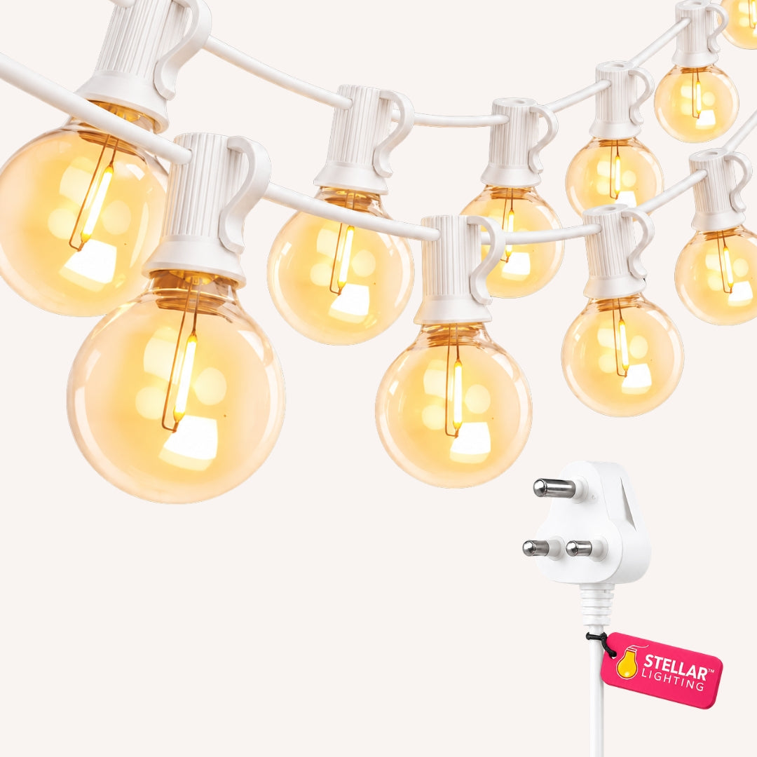 Classic string lights with G40 globe bulbs on white cable with South African 3-pin plug on white background