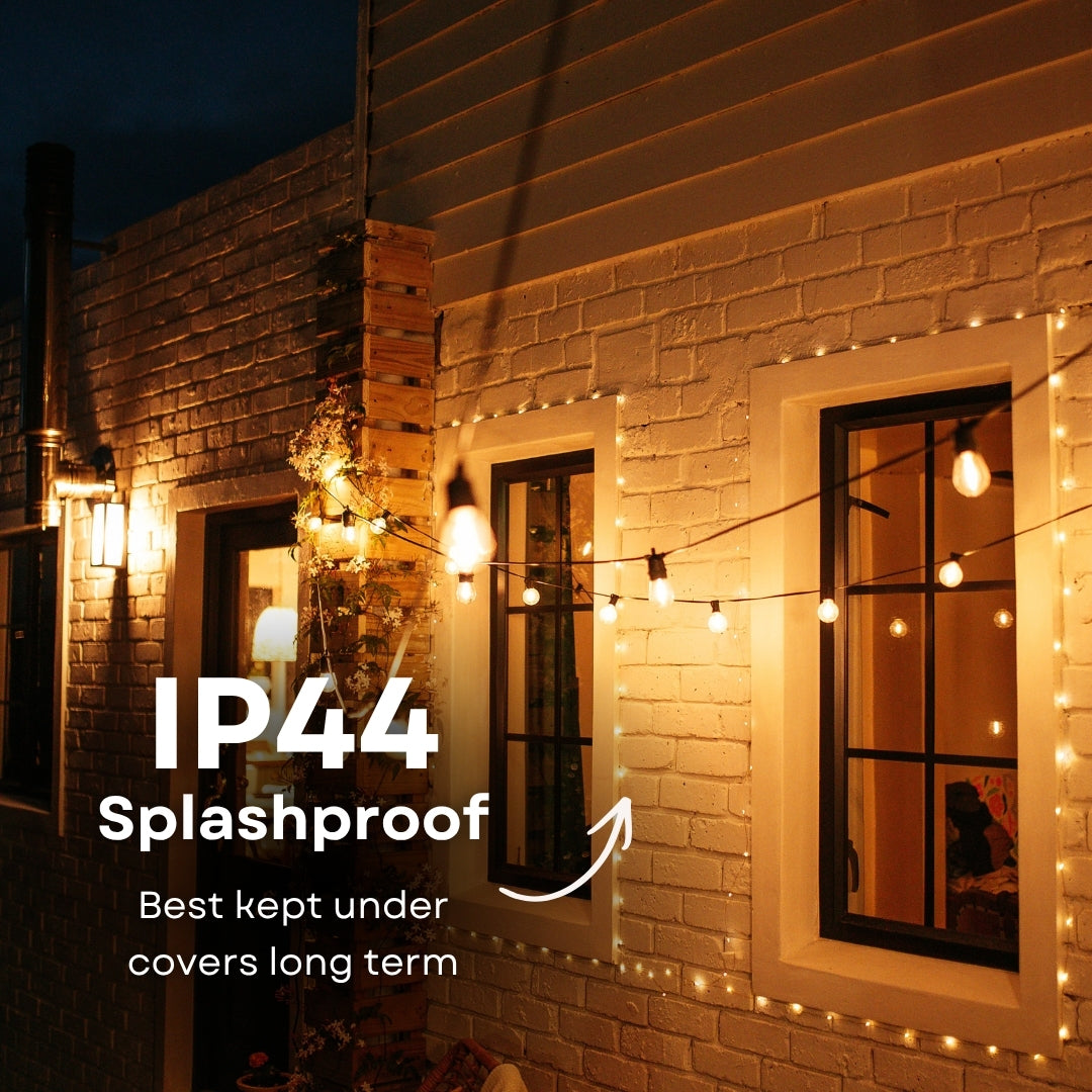 Fairy lights on a brick wall with IP44 splashproof text overlay