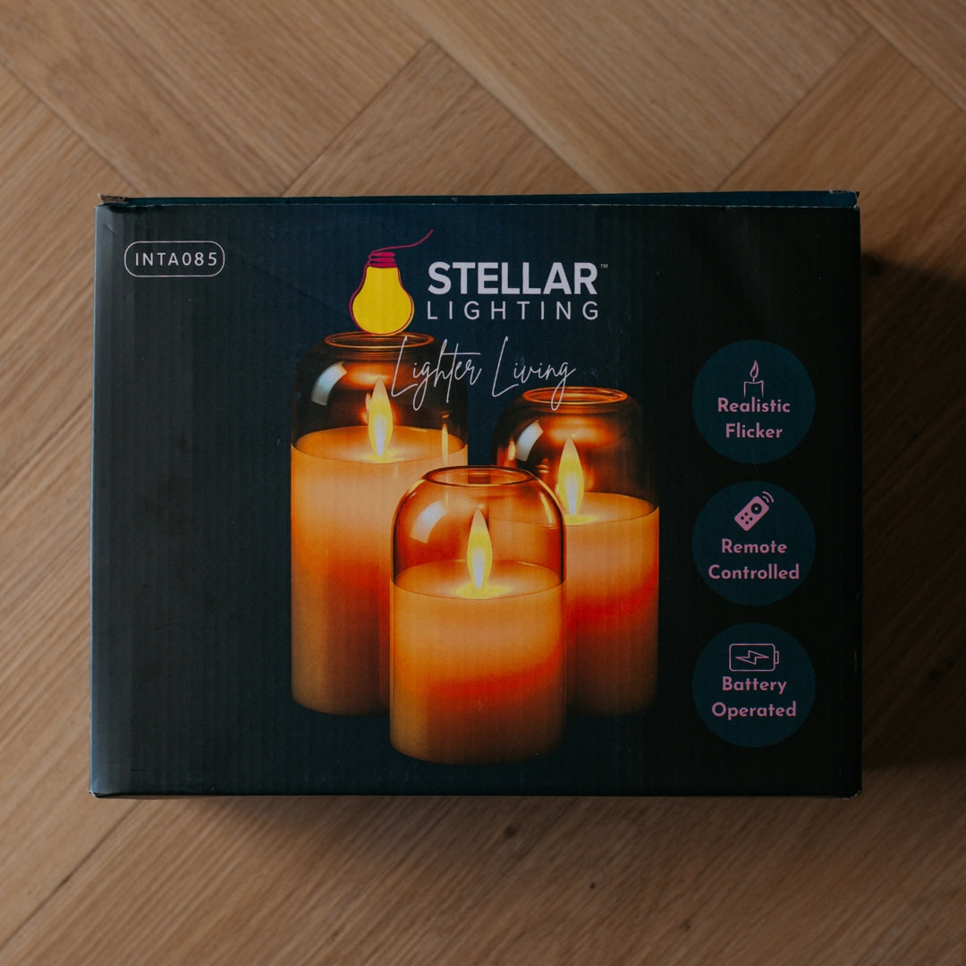 Stellar Lighting product box for domed glass flameless LED candles showing realistic flicker, remote controlled, and battery operated features