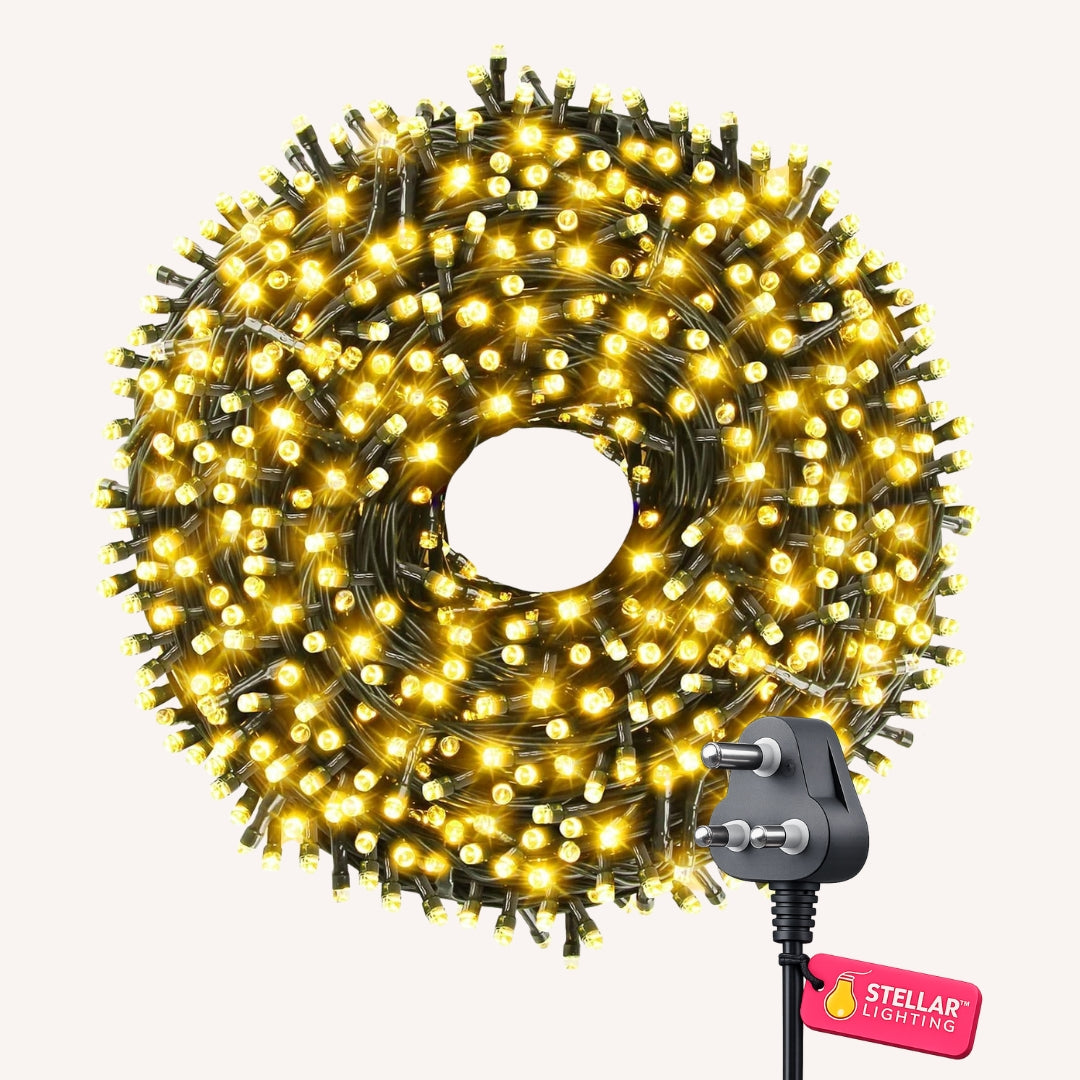 Coiled fairy light with plug and Stellar Lighting logo on a white background