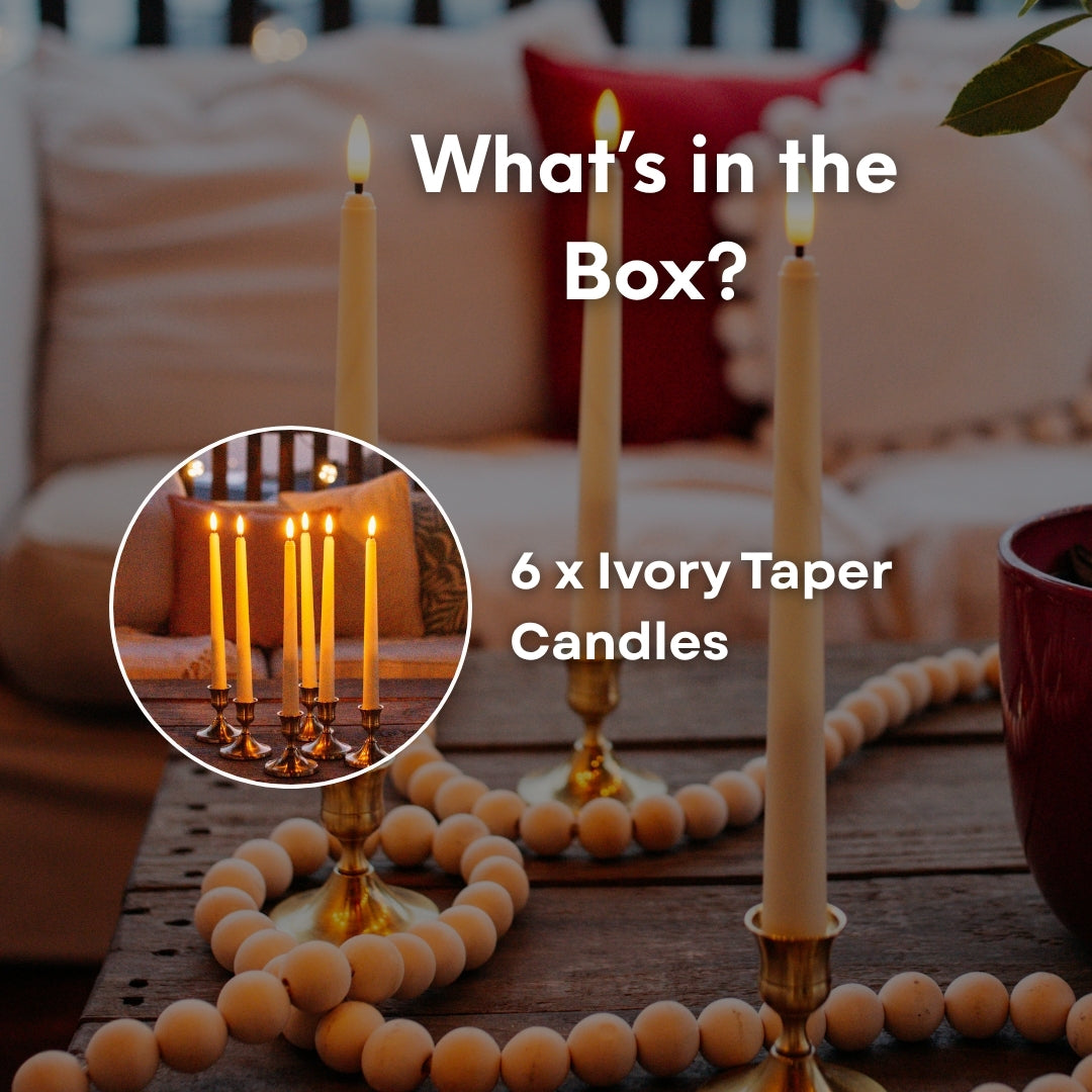What's in the box graphic for ivory flameless taper candles showing 6 ivory taper candles in brass holders with wooden bead garland lifestyle background