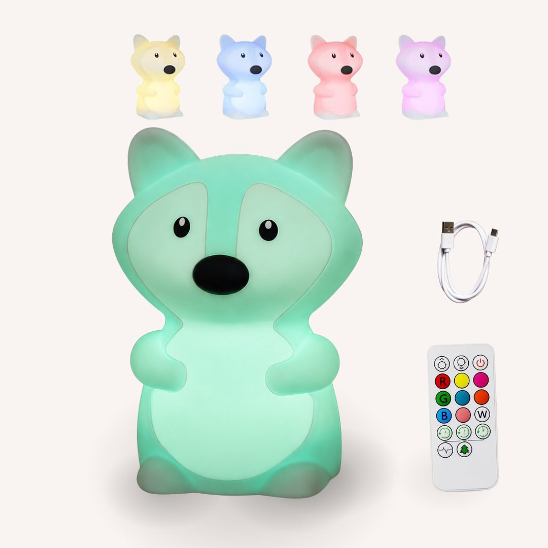 Lightie Fox silicone night light shown in four colour modes including warm white, blue, pink, and purple with USB charging cable and remote control included