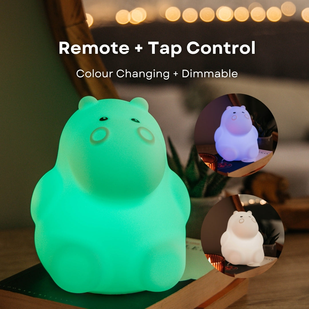 Lightie Hippo night light glowing pink with remote and tap control and colour changing and dimmable callouts and insets showing orange and green colour modes