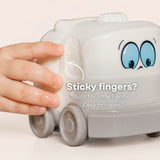 Damp cloth wiping the surface of the Lightie Truck silicone kids night light with sticky fingers and wipe clean callout showing easy cleaning