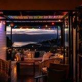 Multicolour Classic String Lights with 25 colourful G40 globe bulbs strung across a South African outdoor party or festive gathering creating a vibrant colourful atmosphere