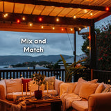 Multicolour Classic String Lights with colourful G40 globe bulbs strung across a South African outdoor garden party creating a warm colourful festive glow at dusk