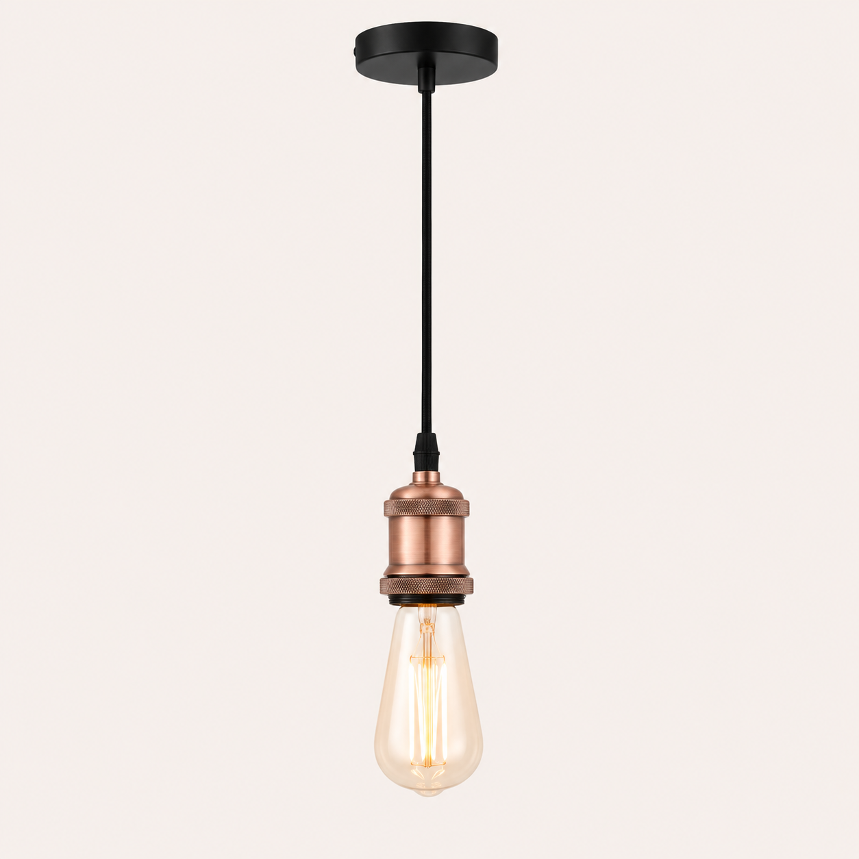 Copper pendant fitting cable hanging from black ceiling rose with vintage Edison filament bulb fitted, shown at full 90cm drop on a light background