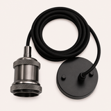 Gun metal pendant fitting cable laid flat showing full length of black braided cable, E27 socket, and black ceiling rose