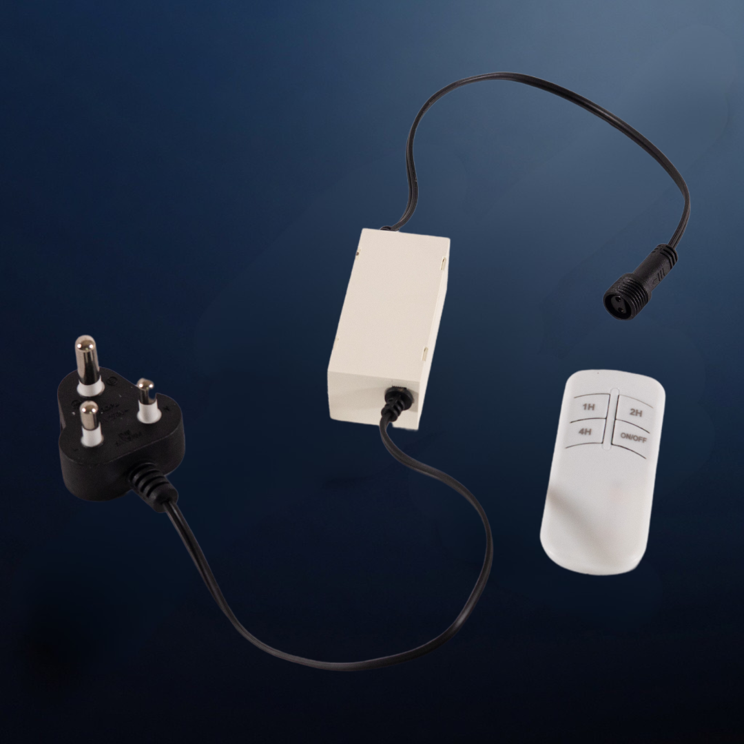 A white electronic control box with a black power cord featuring a SA three-pin plug and a black cable leading to a small white remote control, shown on a dark blue gradient background.