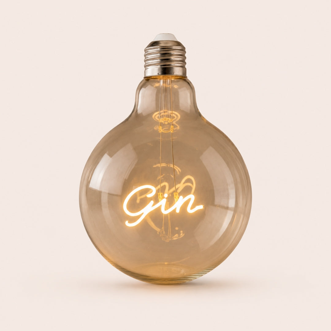 Single G125 globe LED bulb with GIN filament detail and clear glass on a light background