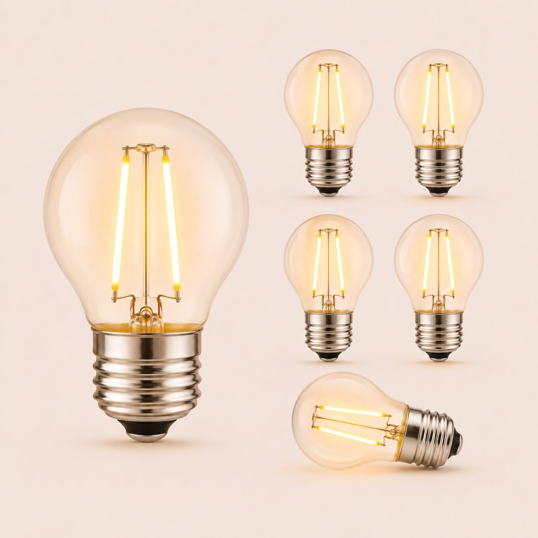 Six G45 globe LED replacement bulbs with E27 fitting and warm white filament glow on a light background