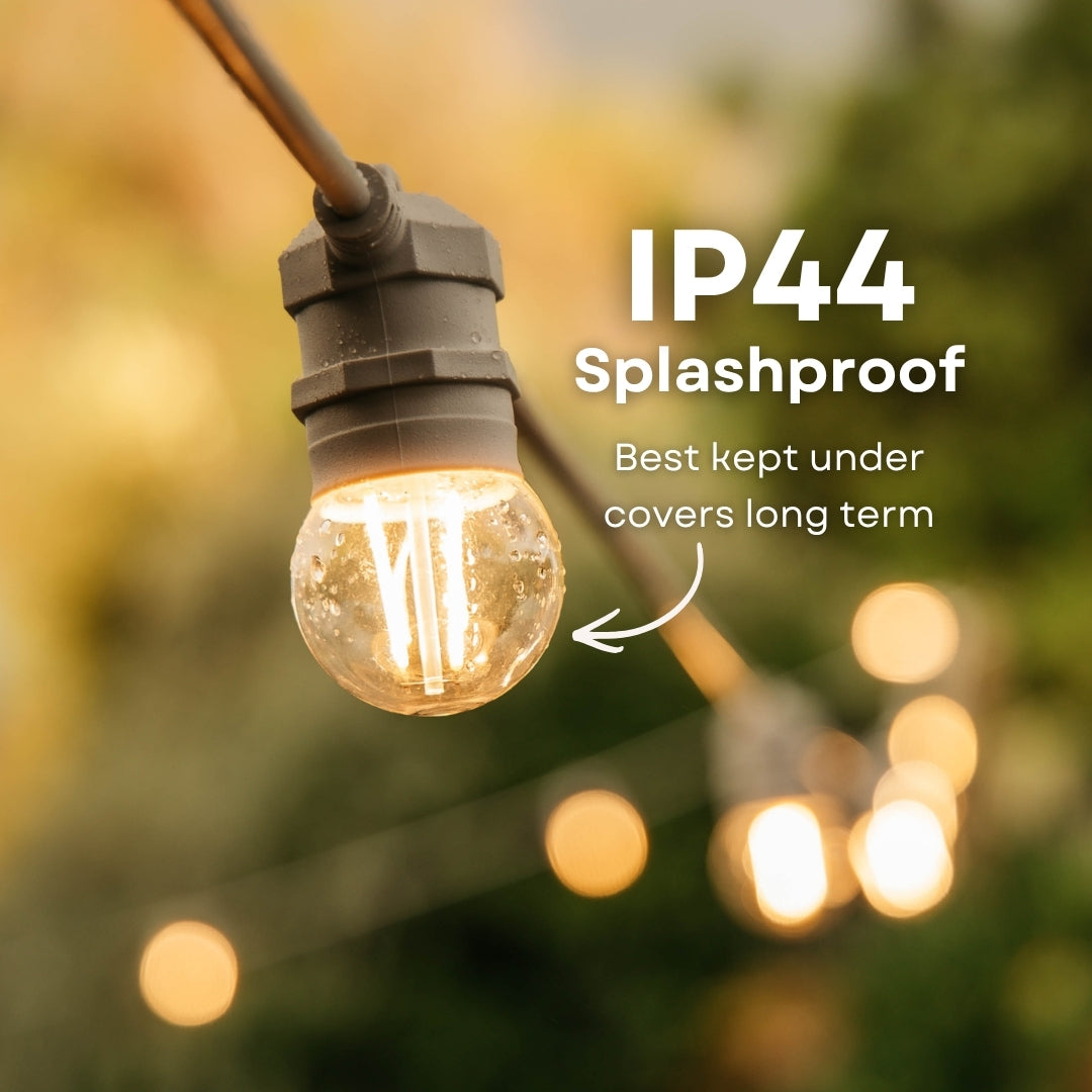 Retro White Festoon String Lights G45 globe bulb on white cable with IP44 splash resistant callout for covered outdoor use