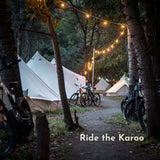 White Festoon String Lights with warm white G45 globe bulbs strung across a South African outdoor venue at Ride the Karoo at dusk