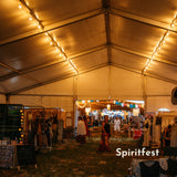 White Festoon String Lights with warm white G45 globe bulbs strung above a South African event Spiritfest