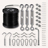 A hardware kit laid out on a light beige background, including a spool of black cable, three silver turnbuckles, multiple wall anchors, screws, hooks, and clips.