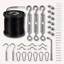 A hardware kit laid out on a light beige background, including a spool of black cable, three silver turnbuckles, multiple wall anchors, screws, hooks, and clips.
