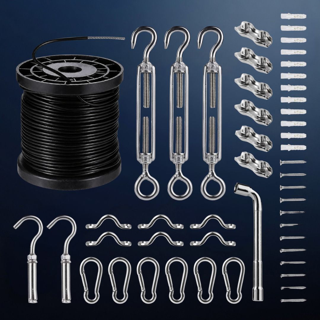 A comprehensive metal hanging kit displayed on a dark blue gradient background, featuring a spool of black wire, three clear-handled tension bolts, multiple silver hooks, carabiners, wall anchors, and mounting screws.