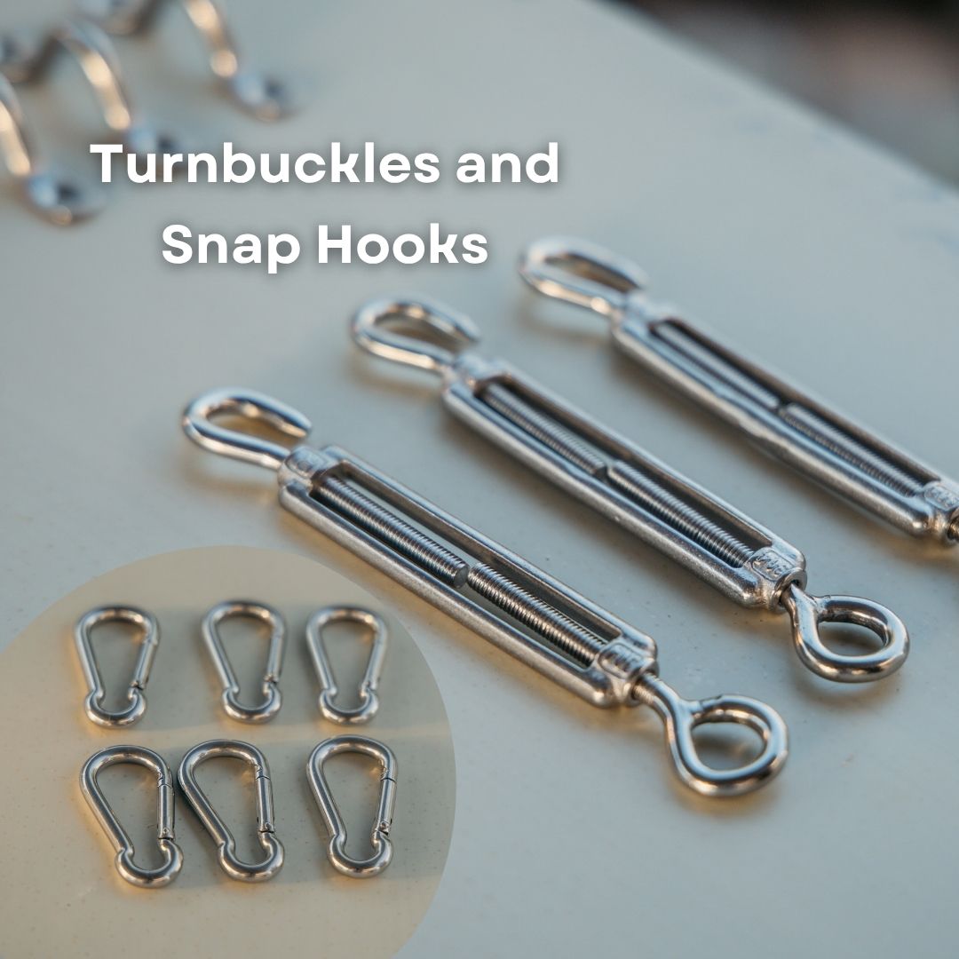 Four silver metal turnbuckles and snap hooks displayed on a light gray surface, with white text reading 'Turnbuckles and Snap Hooks' and a circular inset showing six smaller snap hooks.