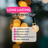 Fairy lights with a focus on durability and setup ease, featuring a warm white bulb and dark green cable.