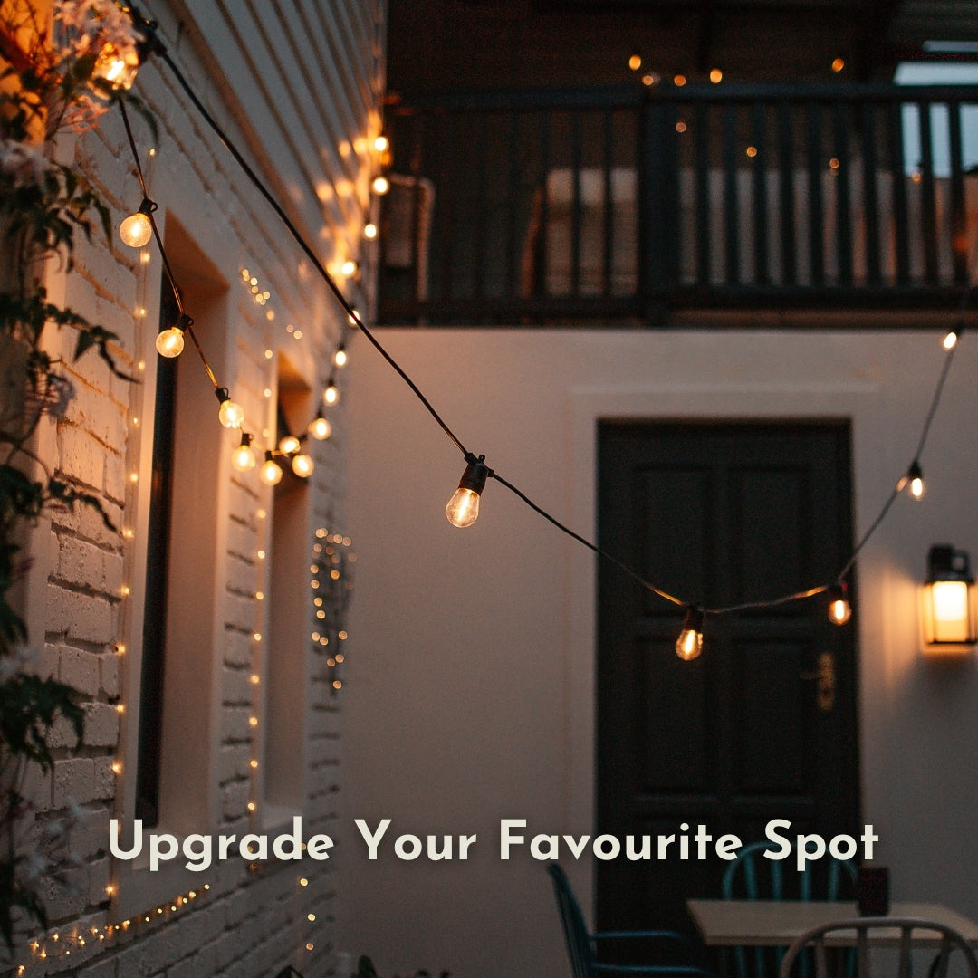 olar Festoon String Lights with warm white S14 vintage LED bulbs strung across a South African garden or covered patio creating a warm golden glow at night