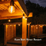 Solar Festoon String Lights with warm white S14 vintage LED bulbs strung across a South African pergola creating a warm golden glow at night
