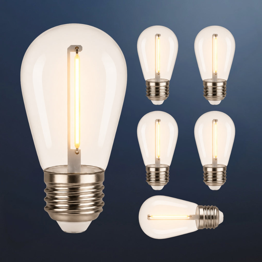 Set of vintage-style S14 E27 light bulbs on a dark blue background