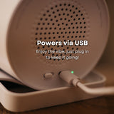 Close-up of speaker wireless charger rear grille with USB-C cable plugged in and powers via USB callout