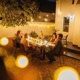 Ultimate Dark Green Fairy Lights with 100 warm white LEDs on dark green cable creating a continuous shimmer in a styled South African garden at dusk