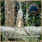 Ultimate White Drop String Lights ST64 bulb glowing warm white in heavy rain with IP66 fully weatherproof badge and callout