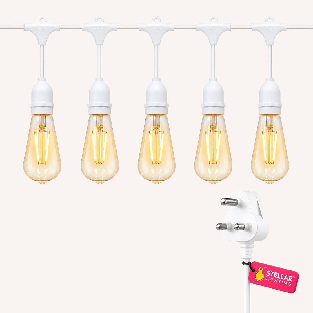 Ultimate White Drop String Lights flat lay showing warm white ST64 LED bulbs on white heavy duty cable with South African plug on a light background