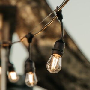 Drop string lights illuminating Casa Cello restaurant at Stanford Hills Estate