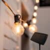 10m solar-powered warm white string lights with 25 LED bulbs for outdoor use in South Africa, perfect for gardens, patios, and load shedding lighting.
