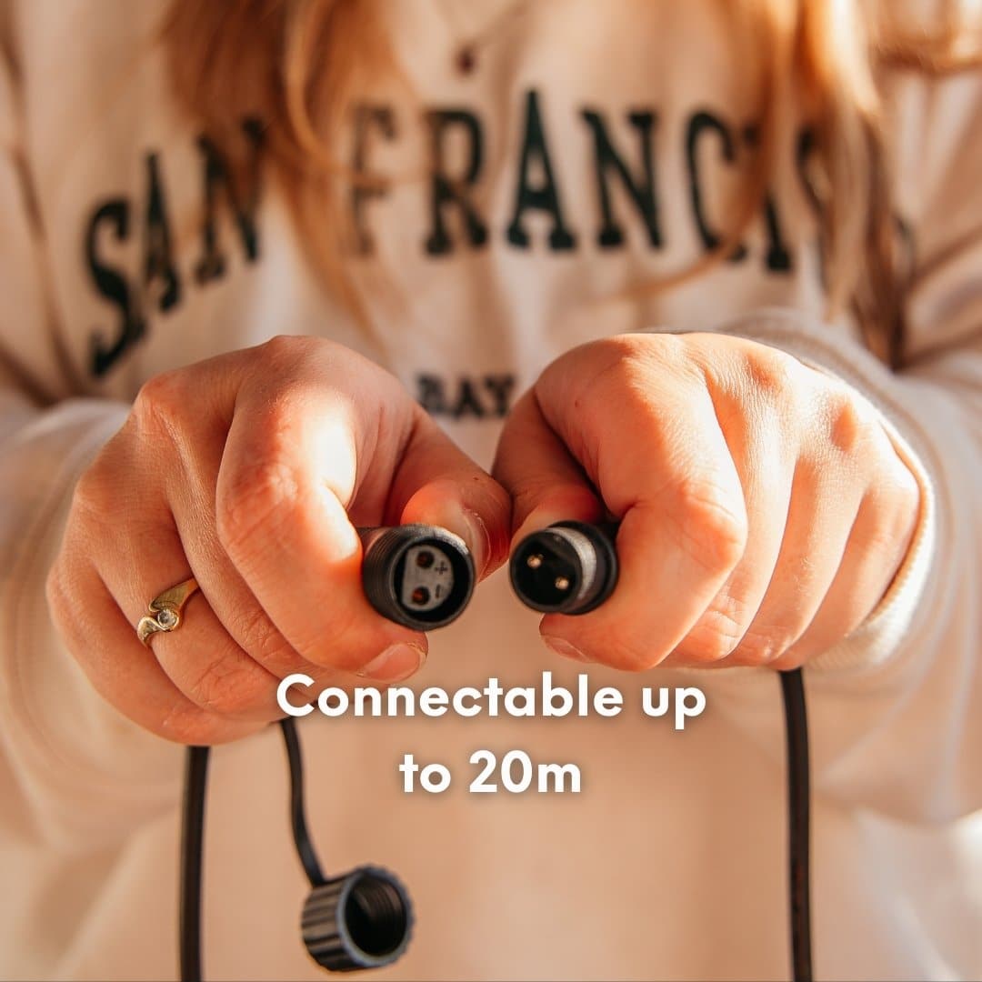 Solar Festoon String Lights with Warm White Glow Warm white solar festoon string lights creating a cosy outdoor glow.