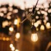 Stellar Lighting Drop String Lights with 20 warm white S14 bulbs on a black cable, 10 metres in length